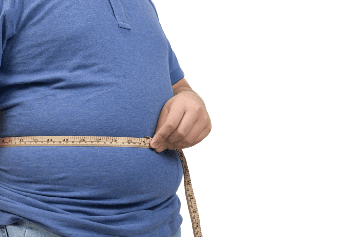 Obese man with measuring tape